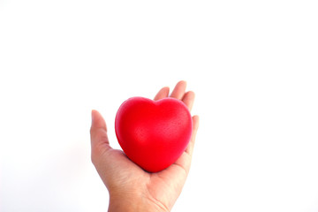 Obraz premium Stock Photo - Red heart in woman hand