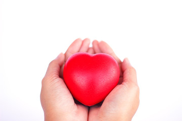 Stock Photo - Red heart in woman hand