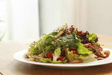 one dish of salad on wood table