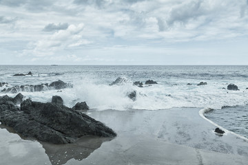 Rocky shore and natural pool. Porto Moniz, Madeira island, Portugal