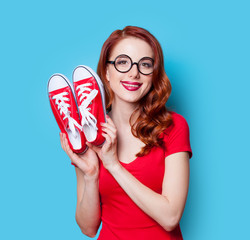 girl in red dress with gumshoes