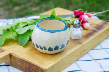 Country style - Handmade dish, vegateble on rustic cutting board