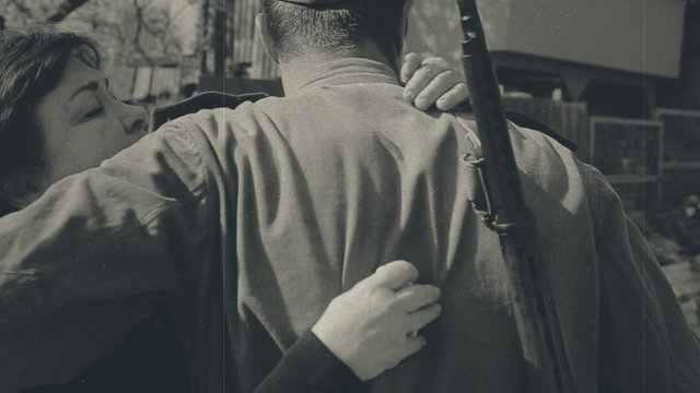 Mother with a heavy heart accompanies her son to war, antique