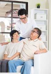 Fototapeta premium asian man with his parents