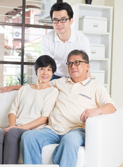asian man with his parents