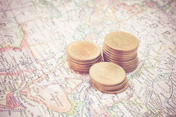 coin and a map  with filter effect retro vintage style