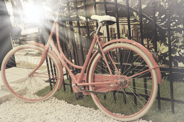 Fototapeta na wymiar vintage photo of red bicycle