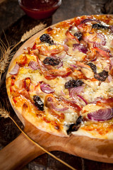 Italian pizza on wooden board