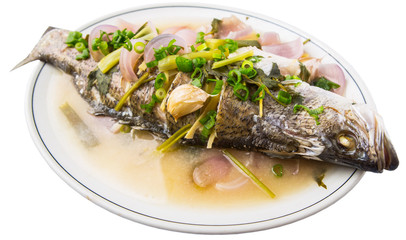 Malaysian dish of sweet and sour steamed Asian bass fish