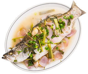Malaysian dish of sweet and sour steamed Asian bass fish