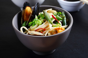 noodles with seafood in a bowl