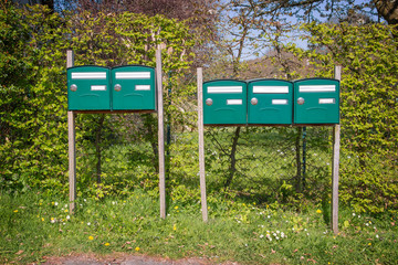 Range of mailboxes in the countryside, France