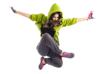 Fototapeten Teenager-Mädchen im Streetdance-Stil springen © luismolinero