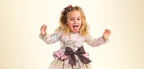 Little girl with beautiful dress jumping