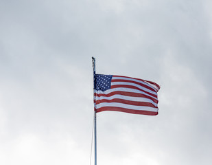 American Flag Flying Under Overcast Sky