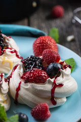 Homemade pavlova meringue with fresh berries