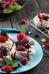 Homemade pavlova meringue with summer fresh berries