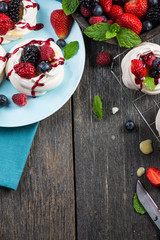 Homemade pavlova meringue with summer fresh berries