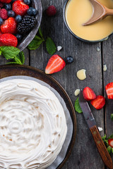 Homemade pavlova meringue with summer fresh berries