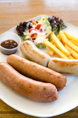 Grilled sausages and vegetables