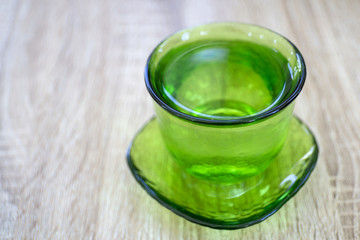 Vintage green glass with water