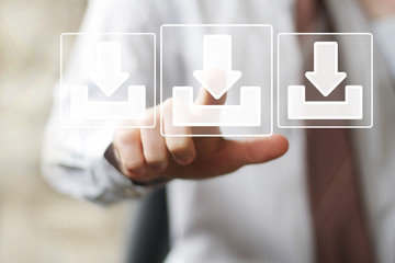 Businessman pushing button virtual download icon