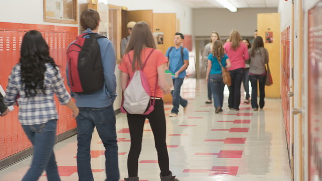 Students walk down the hallway to get to their next class