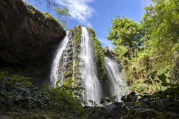 Fototapeta na wymiar High-Water Waterfall in the Spring