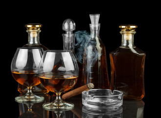 Cognac in bottles and glasses