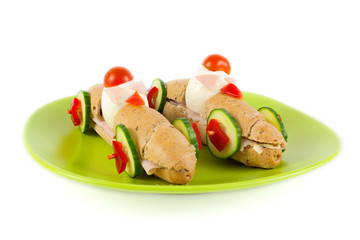 Long sandwiches with ham, cheese, tomatoes, cucumber and egg