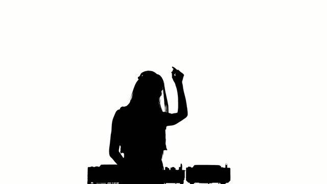 Dj girl in sexy clothes, flipping hair, hands up and claps