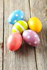 Easter eggs on grey wooden background