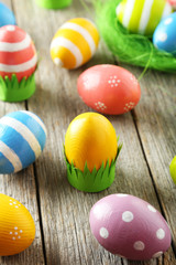 Fototapeta na wymiar Easter eggs on grey wooden background