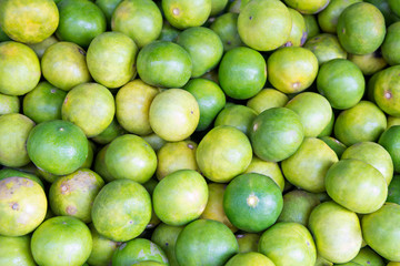 Heap of limes on market
