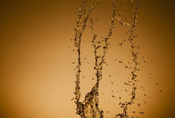 Texture of water on a gold background