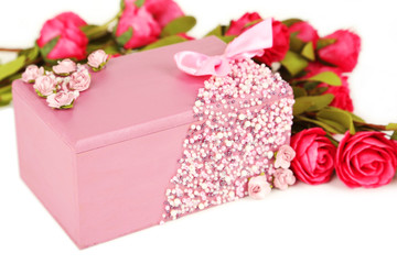 Beautiful casket on white fabric