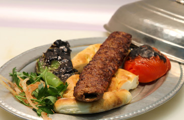 Turkish Kebab served in an anatolian plate.