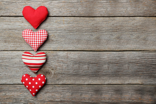 Love hearts on grey wooden background