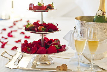 Honeymoon suite with strawberries and a bottle of champagne