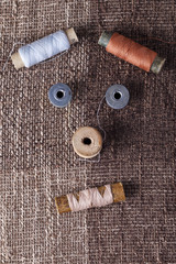 vintage bobbins with colorful threads