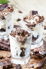 Chocolate dessert with ice cream in a glass, selective focus