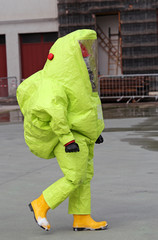 man with yellow protective gear