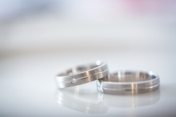 Two splendid wedding rings on a wedding day. Love concept.