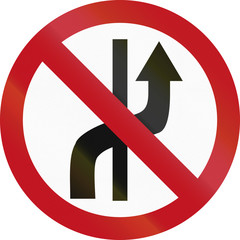 Regulatory road sign in Colombia: No changing of lanes