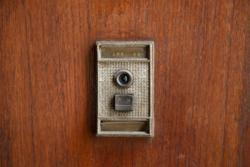 Naklejka premium Retro doorbell with peephole