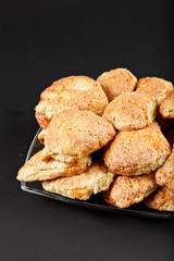  hot tasty oatmeal Cookies on dark paper