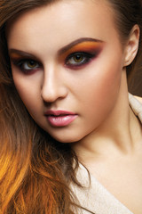 Fototapeta premium portrait of a sexy red-hair woman with bright make up