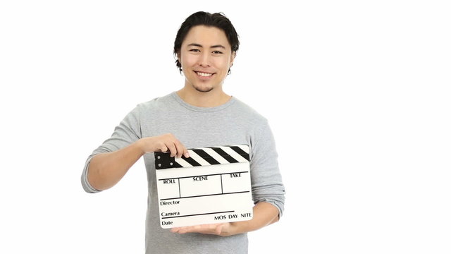Attractive man with movie slate