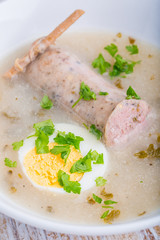 Borscht with eggs and white sausage. (Polish easter soup)