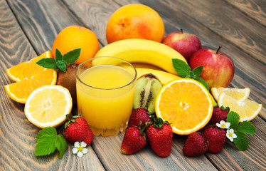 Glass with juice and fresh fruits